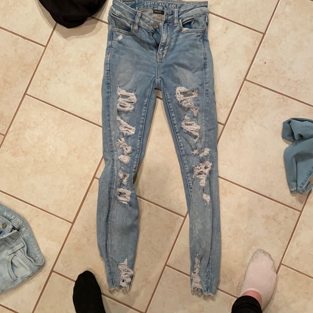 Blue ripped American eagle jeans (next level stretch)